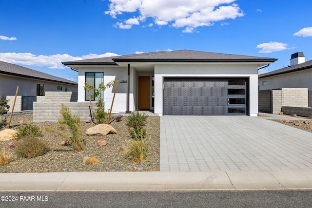 prairie-style house with a garage