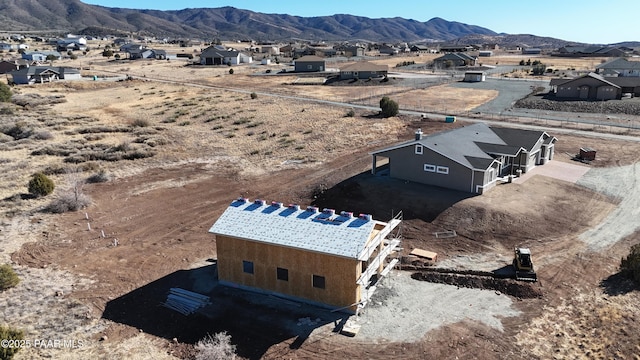 drone / aerial view featuring a mountain view