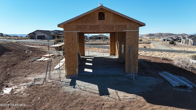 surrounding community with a mountain view