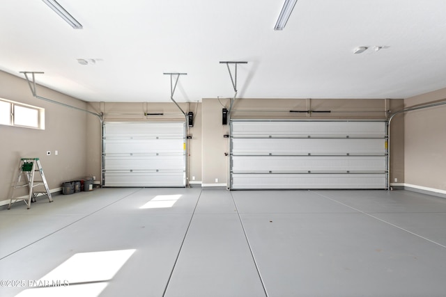 garage featuring baseboards