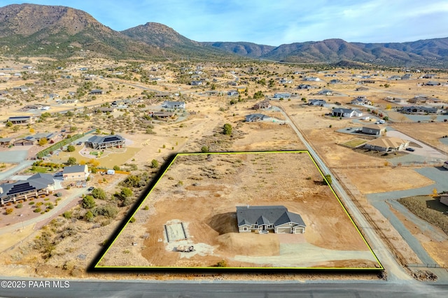 drone / aerial view featuring a mountain view