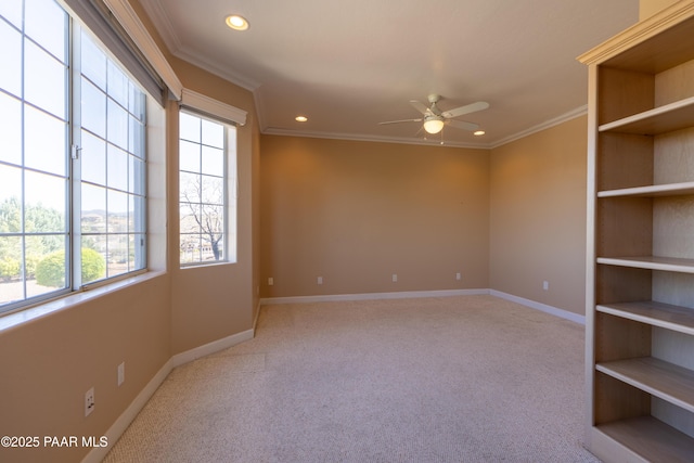 empty room featuring a healthy amount of sunlight, recessed lighting, a ceiling fan, and carpet floors