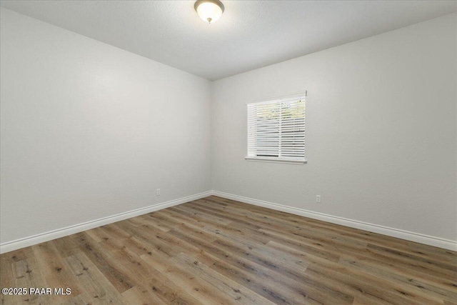 532 Goshawk Trl, Prescott, AZ 86301 - unfurnished room featuring wood finished floors and baseboards