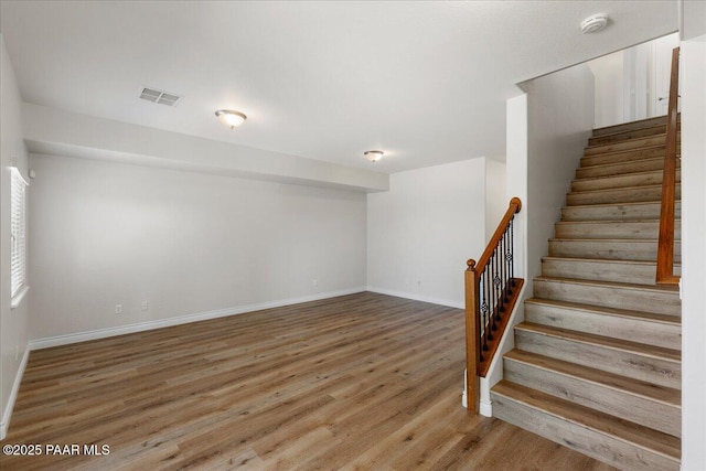 532 Goshawk Trl, Prescott, AZ 86301 - stairs featuring wood finished floors and baseboards
