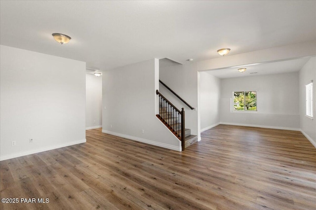 532 Goshawk Trl, Prescott, AZ 86301 - empty room with stairway and wood finished floors