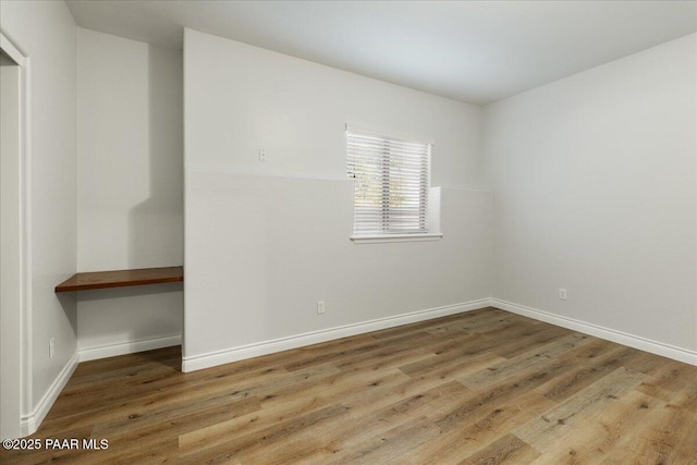 532 Goshawk Trl, Prescott, AZ 86301 - empty room with wood finished floors and baseboards