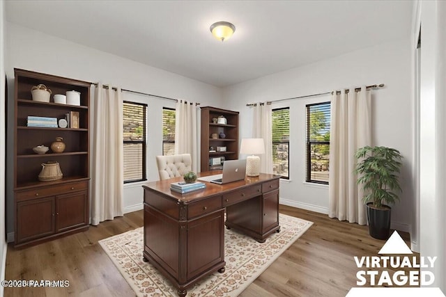 532 Goshawk Trl, Prescott, AZ 86301 - office area with wood finished floors and healthy amount of natural light