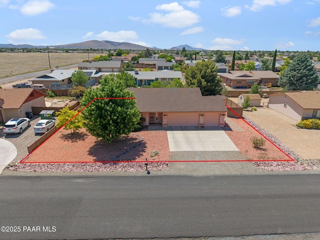 4034 N Sheridan Ln, Prescott Valley, AZ 86314 - aerial view of residential area featuring property parcel outlined and a mountain backdrop