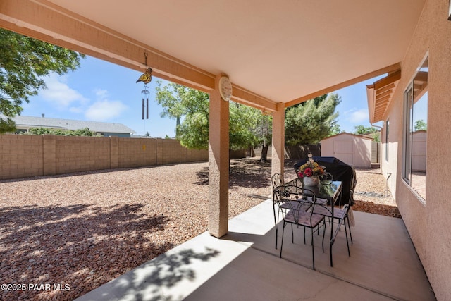 4034 N Sheridan Ln, Prescott Valley, AZ 86314 - fenced backyard with a patio and outdoor dining space