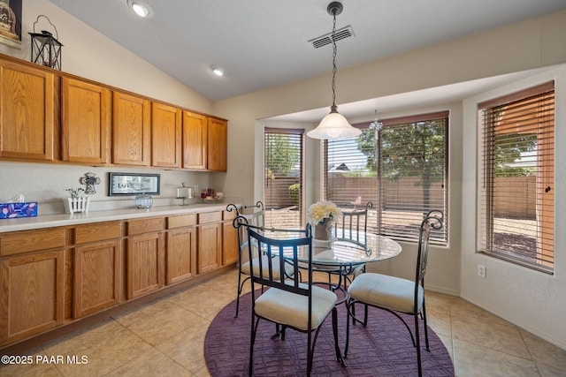 4034 N Sheridan Ln, Prescott Valley, AZ 86314 - dining space featuring light tile patterned floors, vaulted ceiling, and recessed lighting