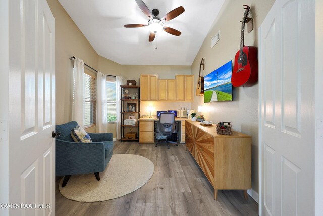 26647 N 43rd St, Cave Creek, AZ 85331 - office featuring built in study area, light wood-style floors, and a ceiling fan