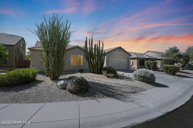 26647 N 43rd St, Cave Creek, AZ 85331 - view of front of property featuring an attached garage and concrete driveway