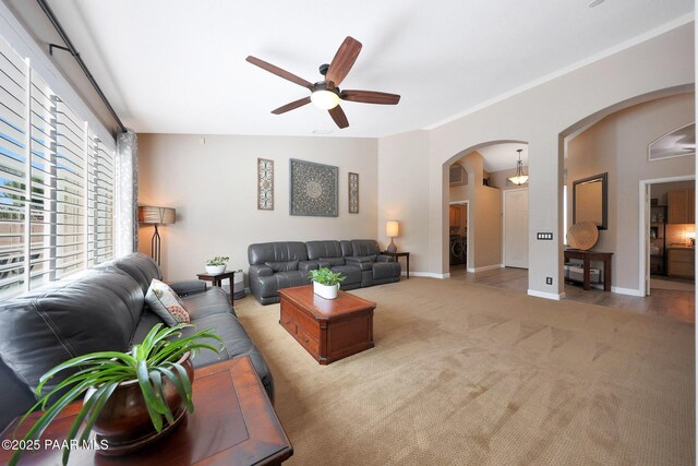 26647 N 43rd St, Cave Creek, AZ 85331 - living room featuring a ceiling fan, arched walkways, and carpet flooring