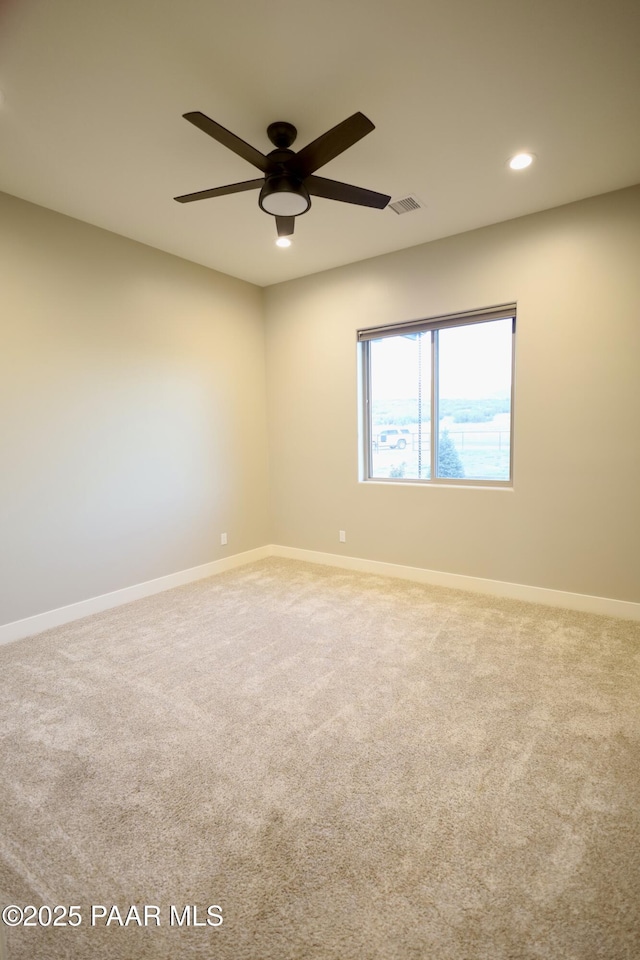 9192 N Doc Bar Rd, Prescott Valley, AZ 86315 - unfurnished room with carpet floors, a ceiling fan, baseboards, and recessed lighting