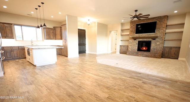 9192 N Doc Bar Rd, Prescott Valley, AZ 86315 - kitchen with open floor plan, ceiling fan, a sink, a kitchen island, and recessed lighting