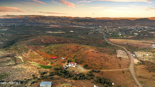 aerial view at dusk with a mountain view