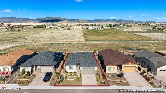 8935 N Tromontana Rd, Prescott Valley, AZ 86315 - view of rural area featuring property parcel outlined, mountains, and nearby suburban area
