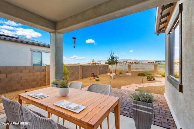 8935 N Tromontana Rd, Prescott Valley, AZ 86315 - view of patio featuring a fenced backyard and outdoor dining space
