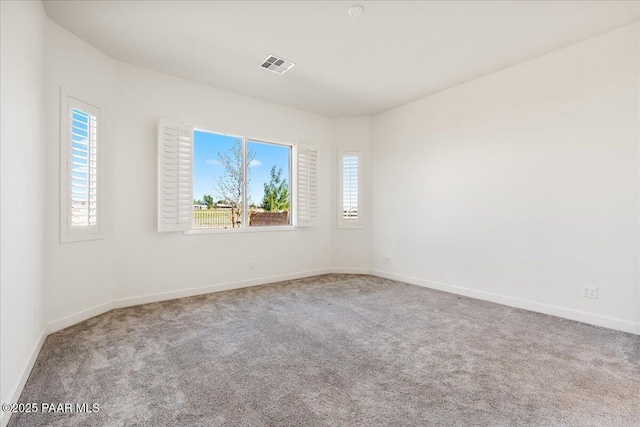 8935 N Tromontana Rd, Prescott Valley, AZ 86315 - carpeted empty room featuring baseboards
