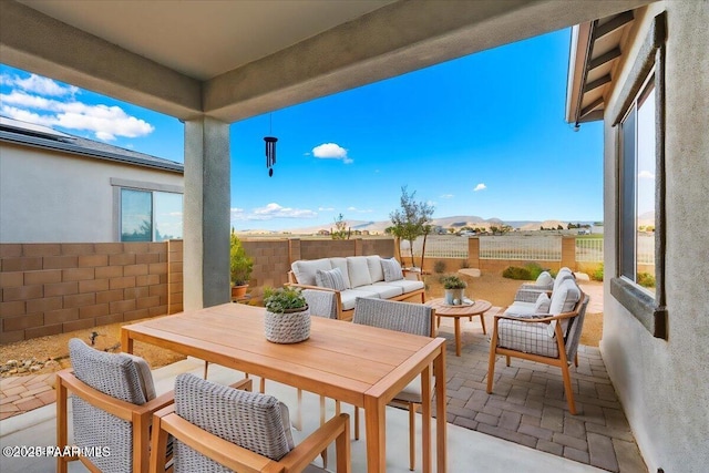 8935 N Tromontana Rd, Prescott Valley, AZ 86315 - view of patio / terrace with an outdoor living space and a fenced backyard