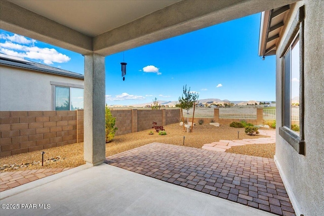 8935 N Tromontana Rd, Prescott Valley, AZ 86315 - view of patio / terrace with a fenced backyard