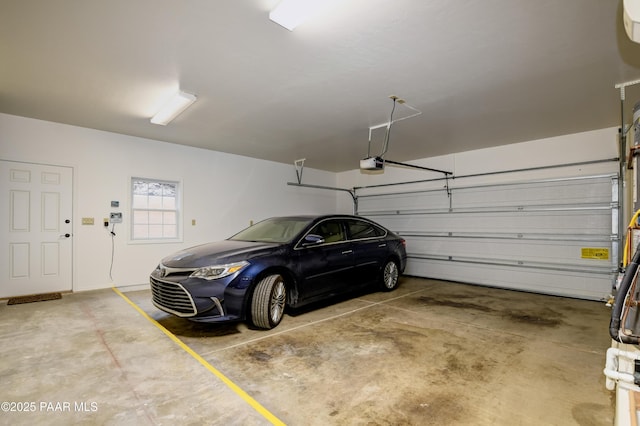 garage featuring a garage door opener