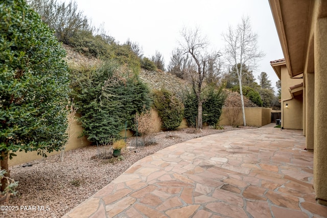 view of patio with fence