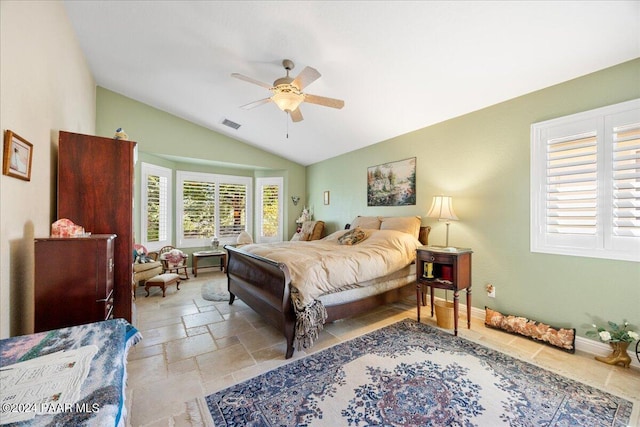 bedroom featuring ceiling fan and lofted ceiling