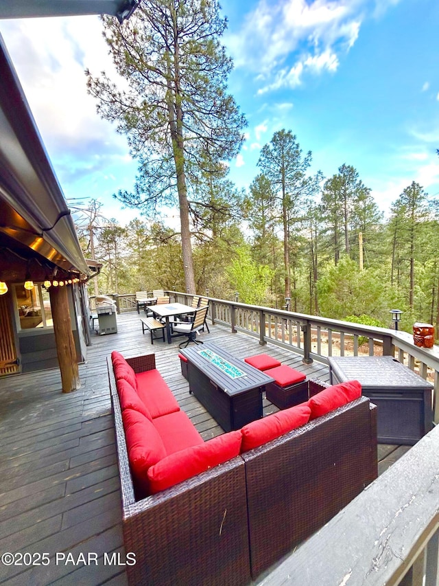 3702 E Pine Mountain Rd, Prescott, AZ 86303 - wooden terrace featuring an outdoor hangout area and outdoor dining space