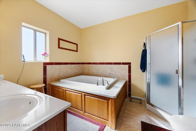 25690 N Burgundy Way, Paulden, AZ 86334 - bathroom featuring a shower stall, toilet, tile patterned flooring, and a garden tub