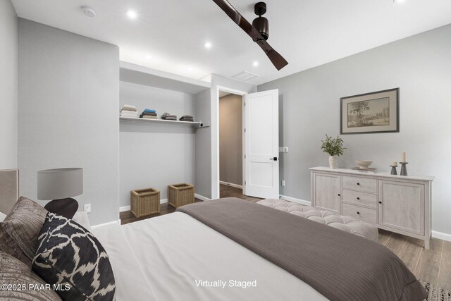5357 Crescent Edge Dr, Prescott, AZ 86301 - bedroom with wood finished floors, baseboards, recessed lighting, and ceiling fan