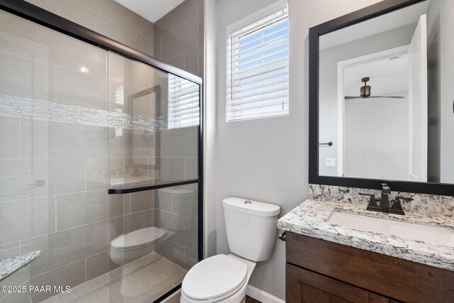 5357 Crescent Edge Dr, Prescott, AZ 86301 - full bath featuring toilet, a stall shower, ceiling fan, and vanity