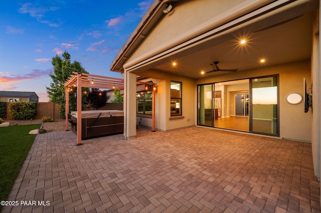 5357 Crescent Edge Dr, Prescott, AZ 86301 - view of patio / terrace with a hot tub, a fenced backyard, a pergola, and ceiling fan