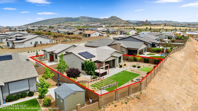 5357 Crescent Edge Dr, Prescott, AZ 86301 - aerial perspective of suburban area with property parcel outlined and a mountain backdrop