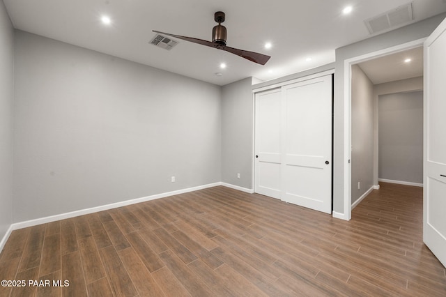 5357 Crescent Edge Dr, Prescott, AZ 86301 - unfurnished bedroom with wood finished floors, baseboards, a closet, recessed lighting, and ceiling fan