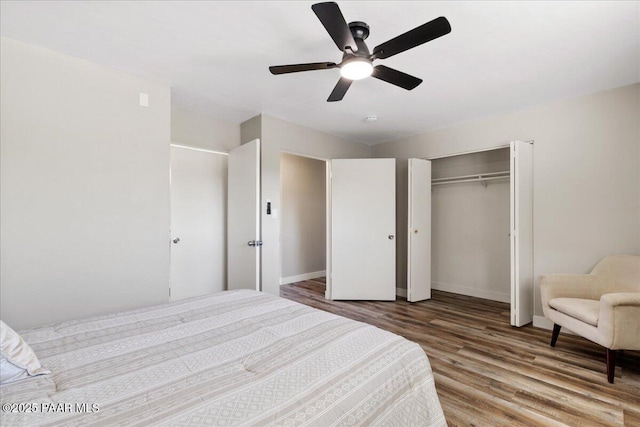 1287 N Lois Dr, Prescott, AZ 86301 - bedroom with wood finished floors, a ceiling fan, and a closet