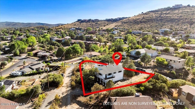 1287 N Lois Dr, Prescott, AZ 86301 - aerial perspective of suburban area with property boundaries highlighted and a mountain backdrop