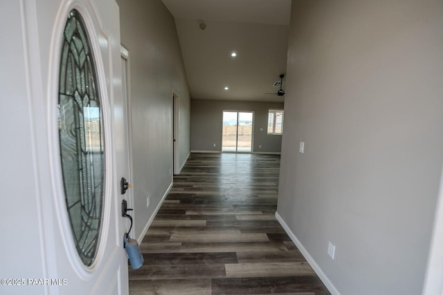 hallway with dark hardwood / wood-style floors