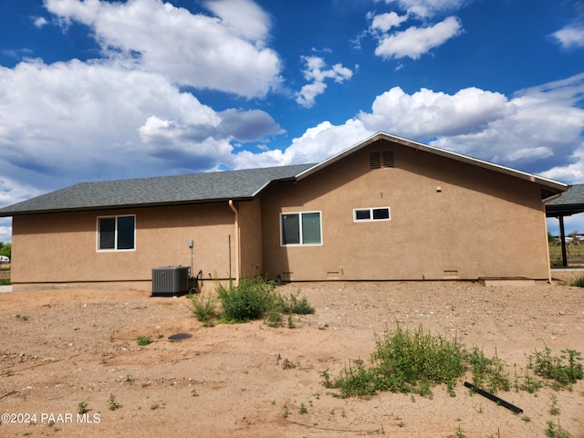 back of property with cooling unit