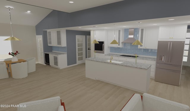 kitchen featuring white cabinets, wall chimney exhaust hood, tasteful backsplash, decorative light fixtures, and a kitchen island