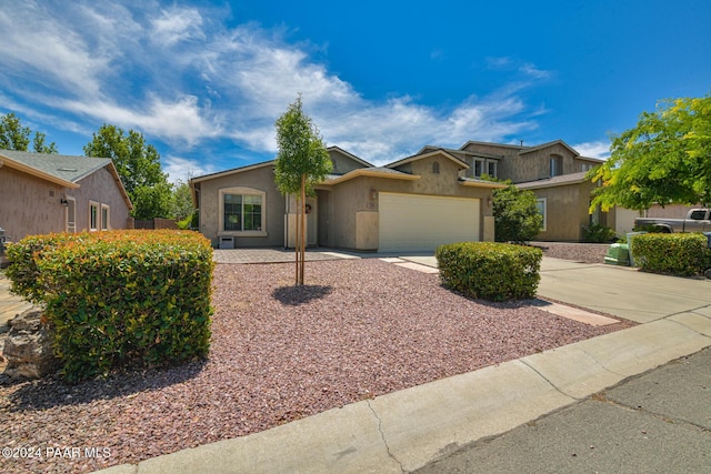 single story home with a garage