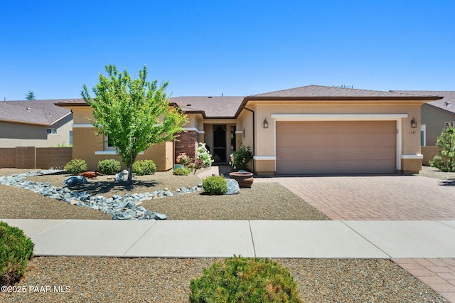 1147 N Lucky Draw Dr, Prescott Valley, AZ 86314 - single story home featuring decorative driveway, a garage, and stucco siding