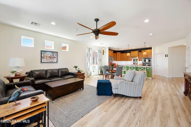 1147 N Lucky Draw Dr, Prescott Valley, AZ 86314 - living area featuring a ceiling fan, recessed lighting, and light wood finished floors