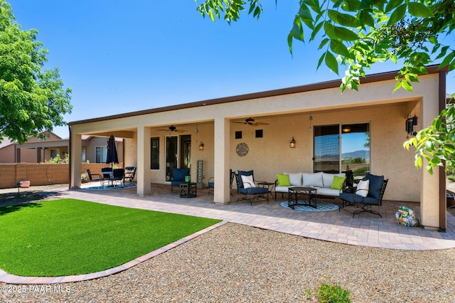 1147 N Lucky Draw Dr, Prescott Valley, AZ 86314 - rear view of property featuring a ceiling fan, stucco siding, an outdoor living space, and a patio