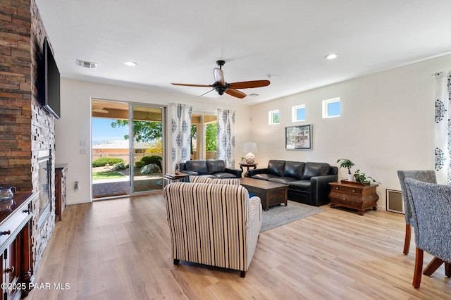 1147 N Lucky Draw Dr, Prescott Valley, AZ 86314 - living area featuring ceiling fan, light wood finished floors, recessed lighting, a fireplace, and baseboards