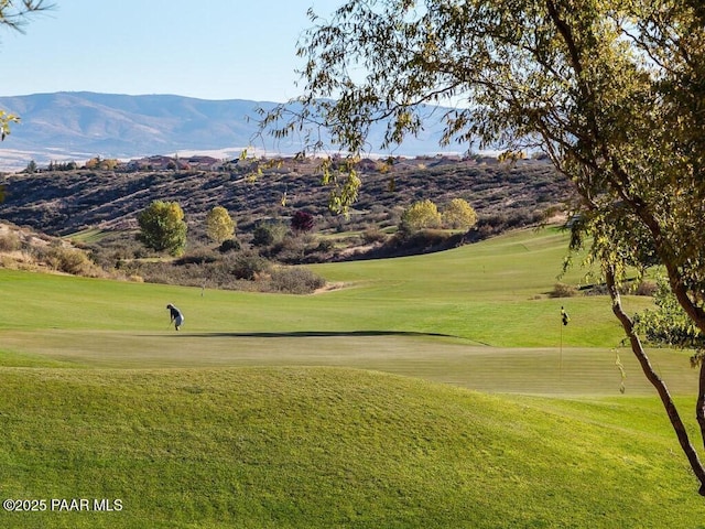 1147 N Lucky Draw Dr, Prescott Valley, AZ 86314 - view of community featuring view of golf course, a mountain view, and a lawn