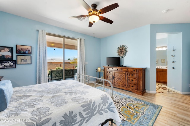1147 N Lucky Draw Dr, Prescott Valley, AZ 86314 - bedroom with access to exterior, wood finished floors, ensuite bathroom, baseboards, and a ceiling fan