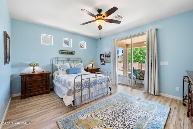 1147 N Lucky Draw Dr, Prescott Valley, AZ 86314 - bedroom featuring access to exterior, baseboards, wood finished floors, and ceiling fan