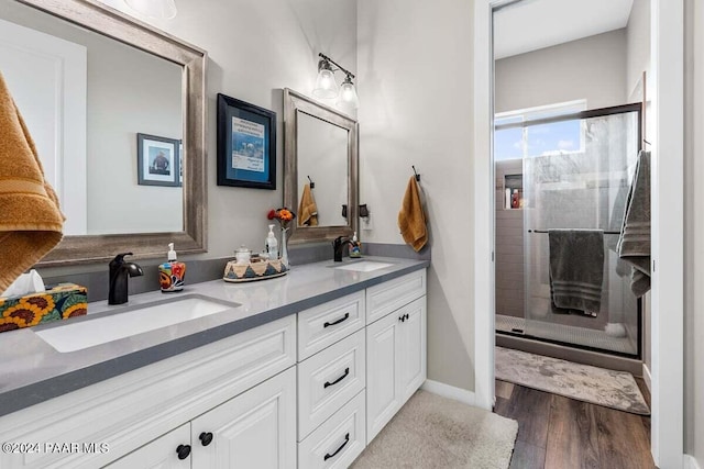 9820 N Echo Ridge Cir, Prescott Valley, AZ 86315 - full bathroom featuring wood finished floors, a stall shower, and a sink