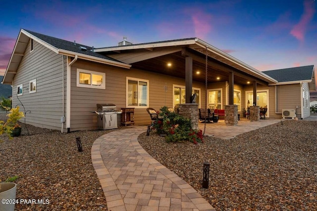 9820 N Echo Ridge Cir, Prescott Valley, AZ 86315 - back of property featuring ac unit and a patio